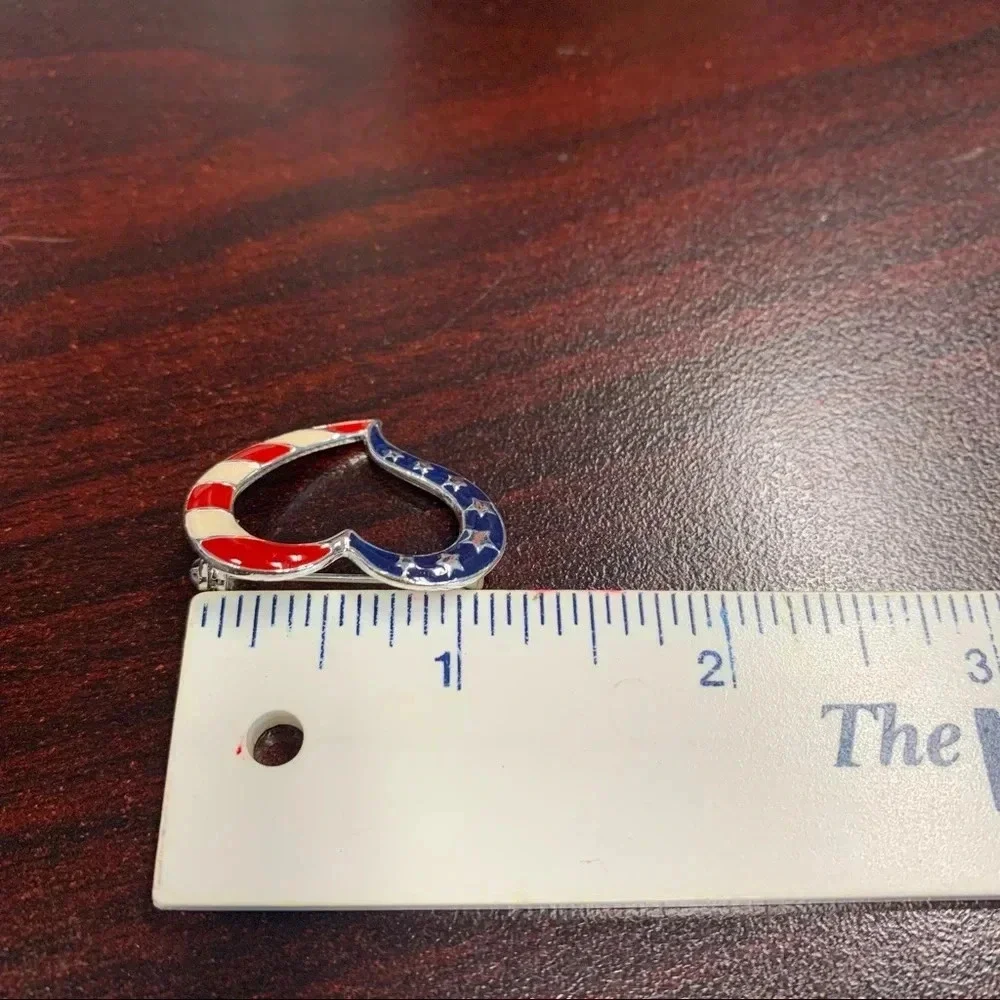 Avon silver heart shaped American flag inspired pin